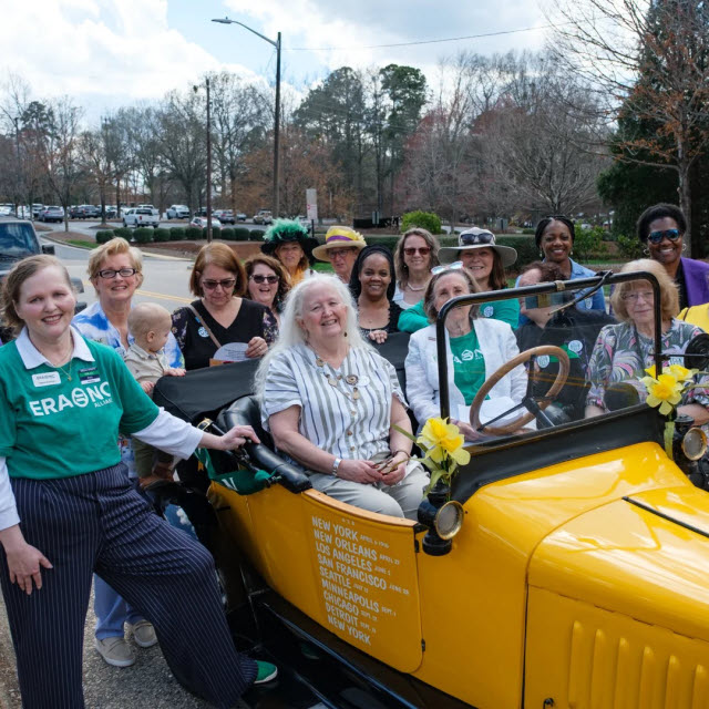 A group photo of the Golden Flyer II from it's stop at the Women's Club of Raleigh.